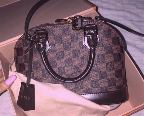 how to differeniate louis vuitton fake alma|louis vuitton alma bag authentication.